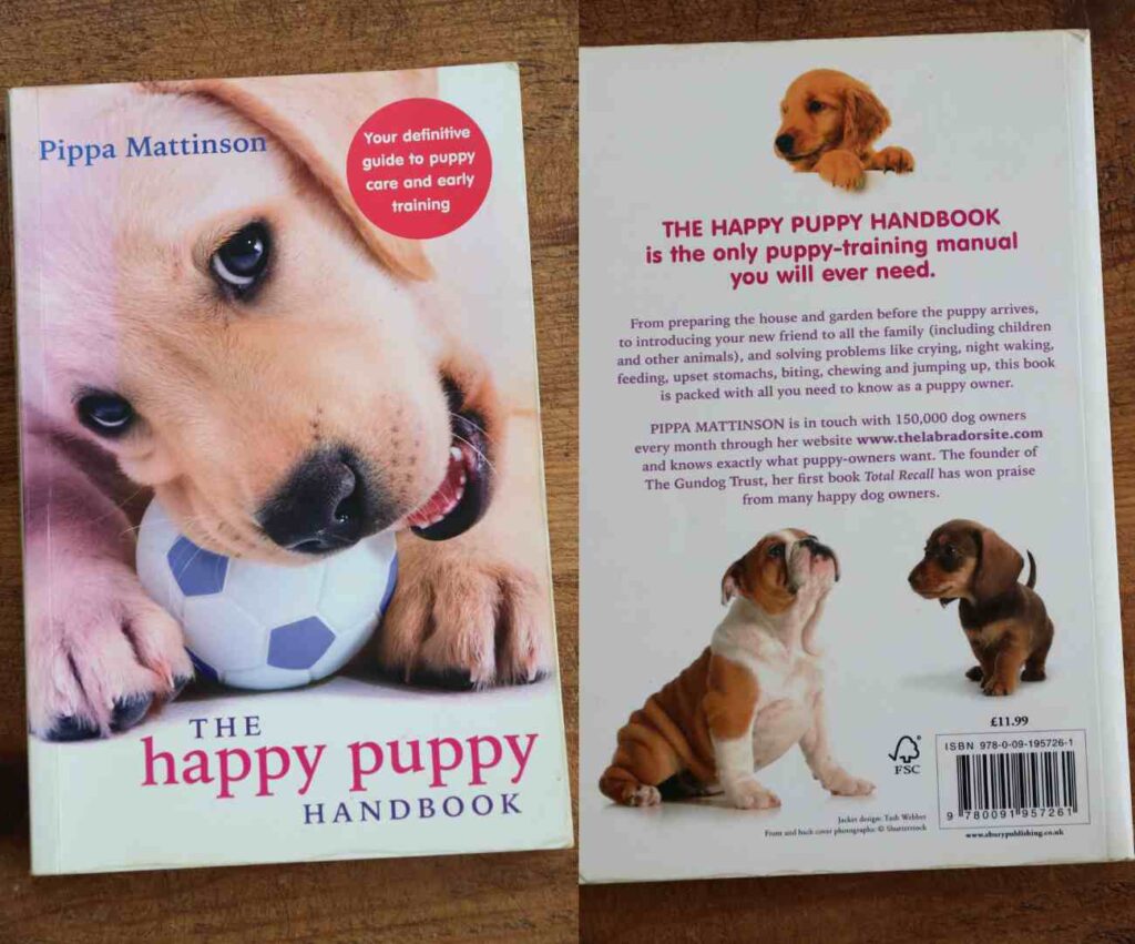 Photo of The Happy Puppy Handbook, front and back covers, by Pippa Mattinson